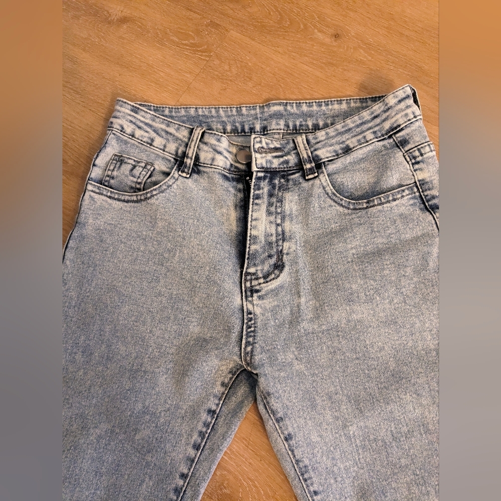 light faded jeans, flared bottom, lots of stretch
